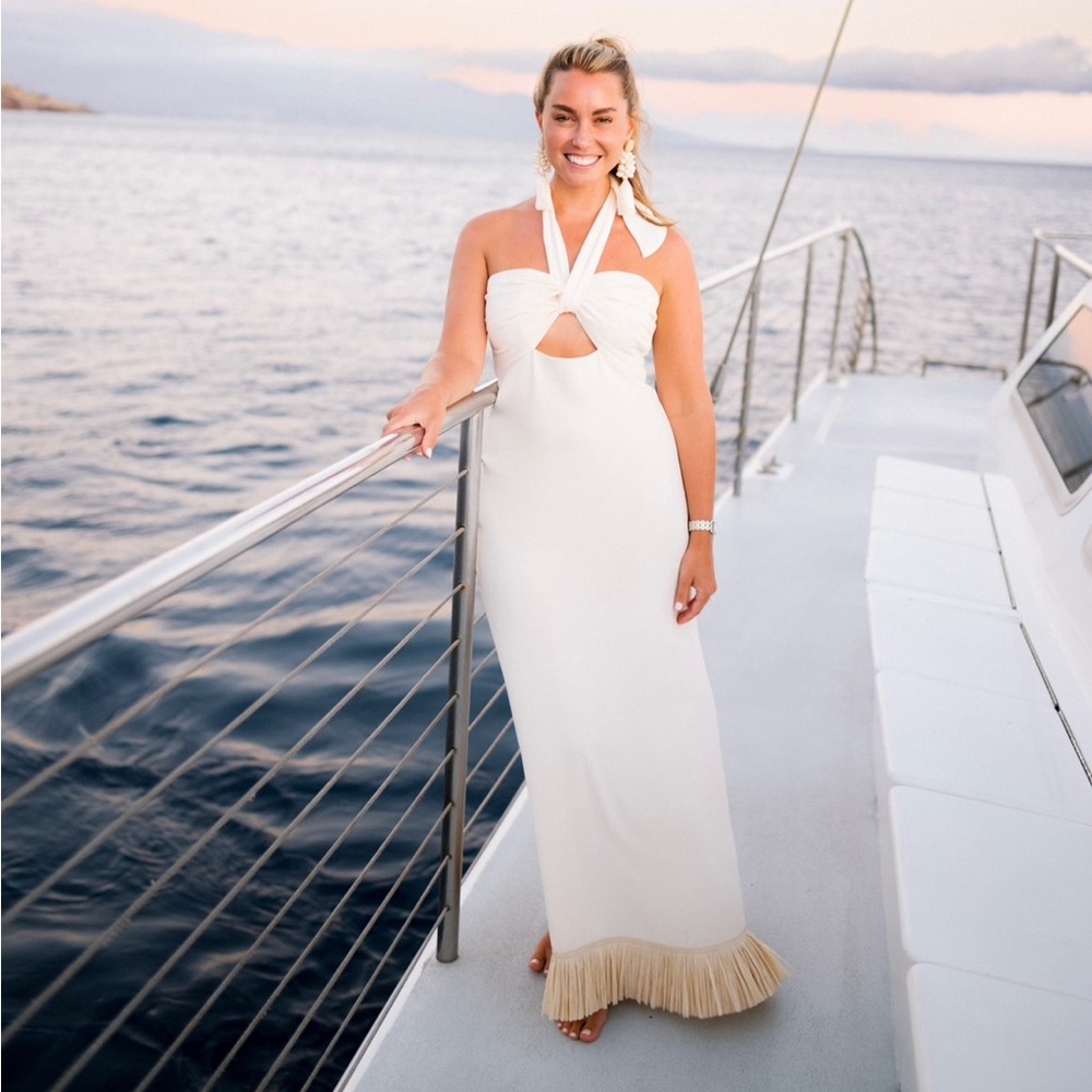 Johanna Ortiz cocktails in Zanzibar raffia fringed midi dress